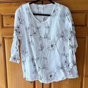 Cut Loose White Blouse with Black Floral Design